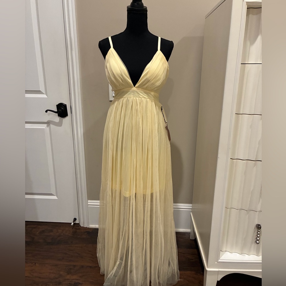 NWT soft yellow Maxi Dress by Haute Monde.